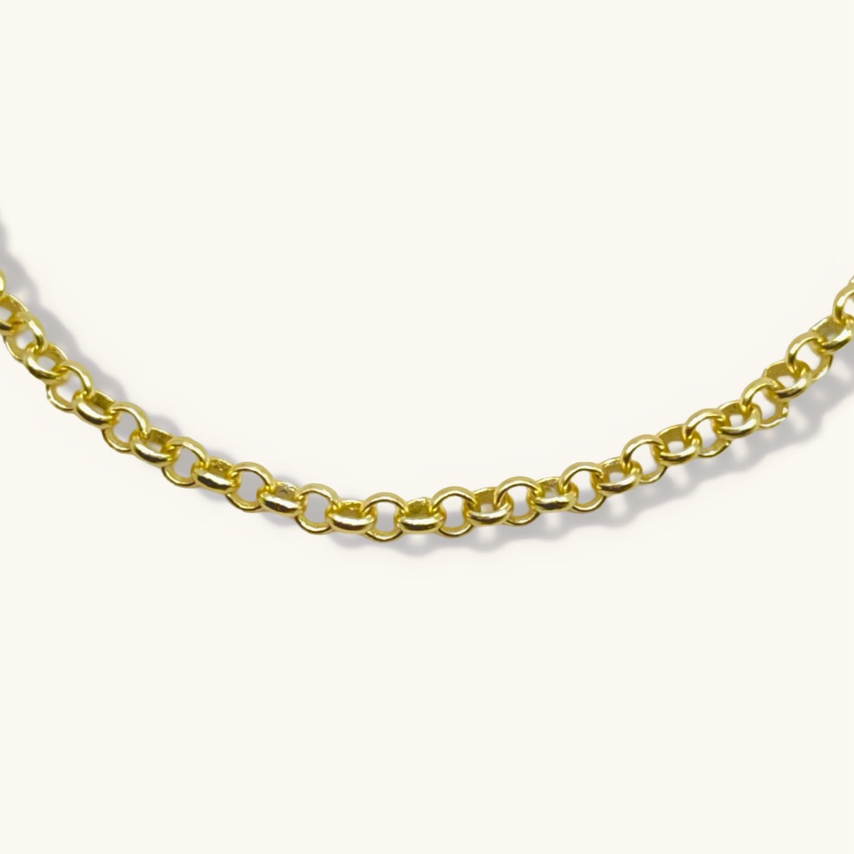 Pulsera de cadena rolo con inicial de corazón y piedra preciosa redonda