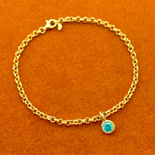 Pulsera de cadena rolo con inicial de corazón y piedra preciosa redonda