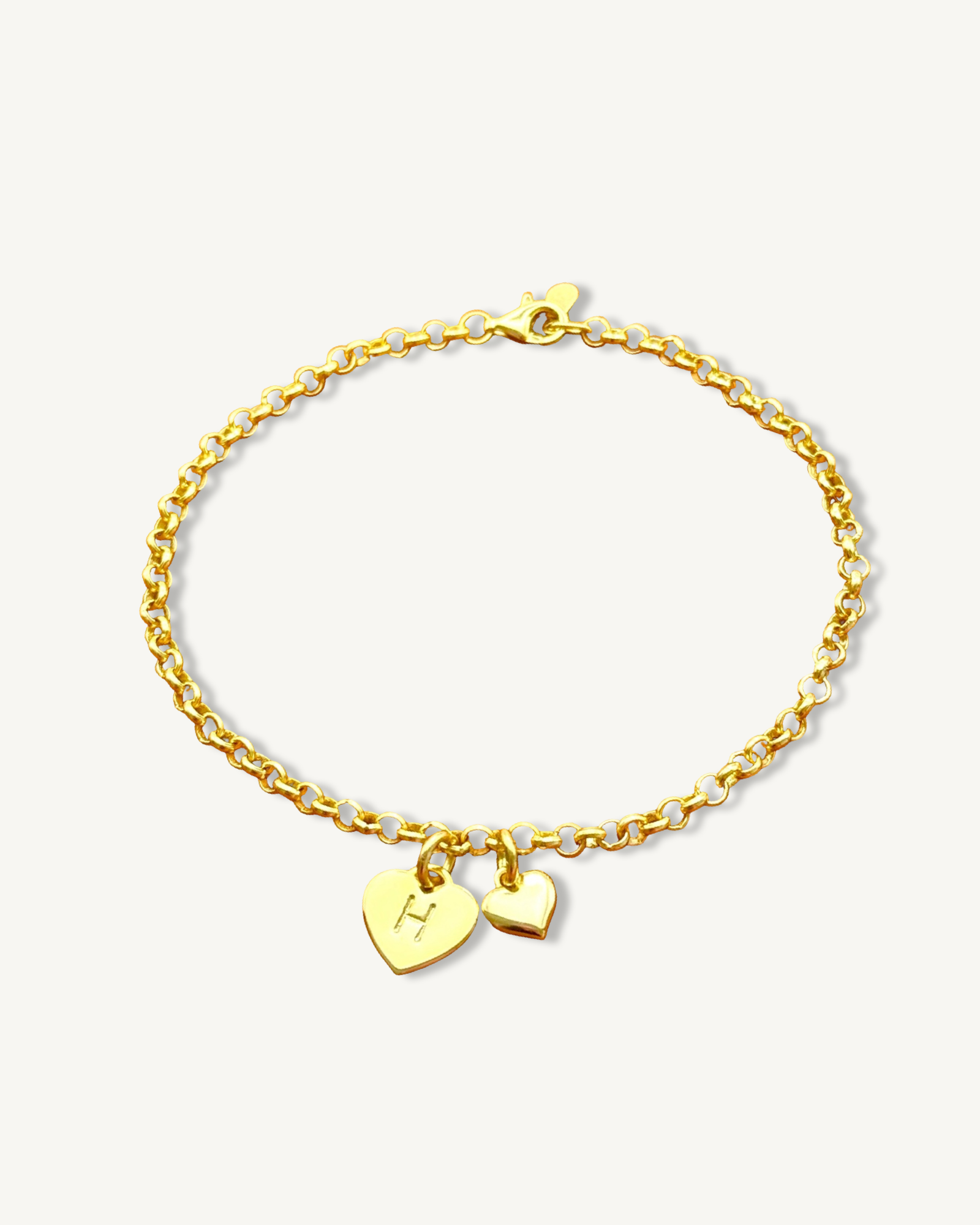 Pulsera de cadena rolo con inicial de corazón y dije de corazón