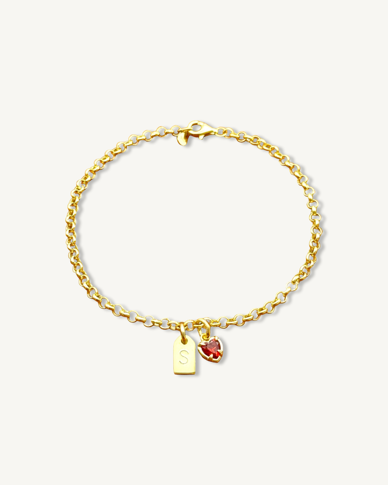 Pulsera de cadena rolo con colgante de corazón rojo y etiqueta inicial