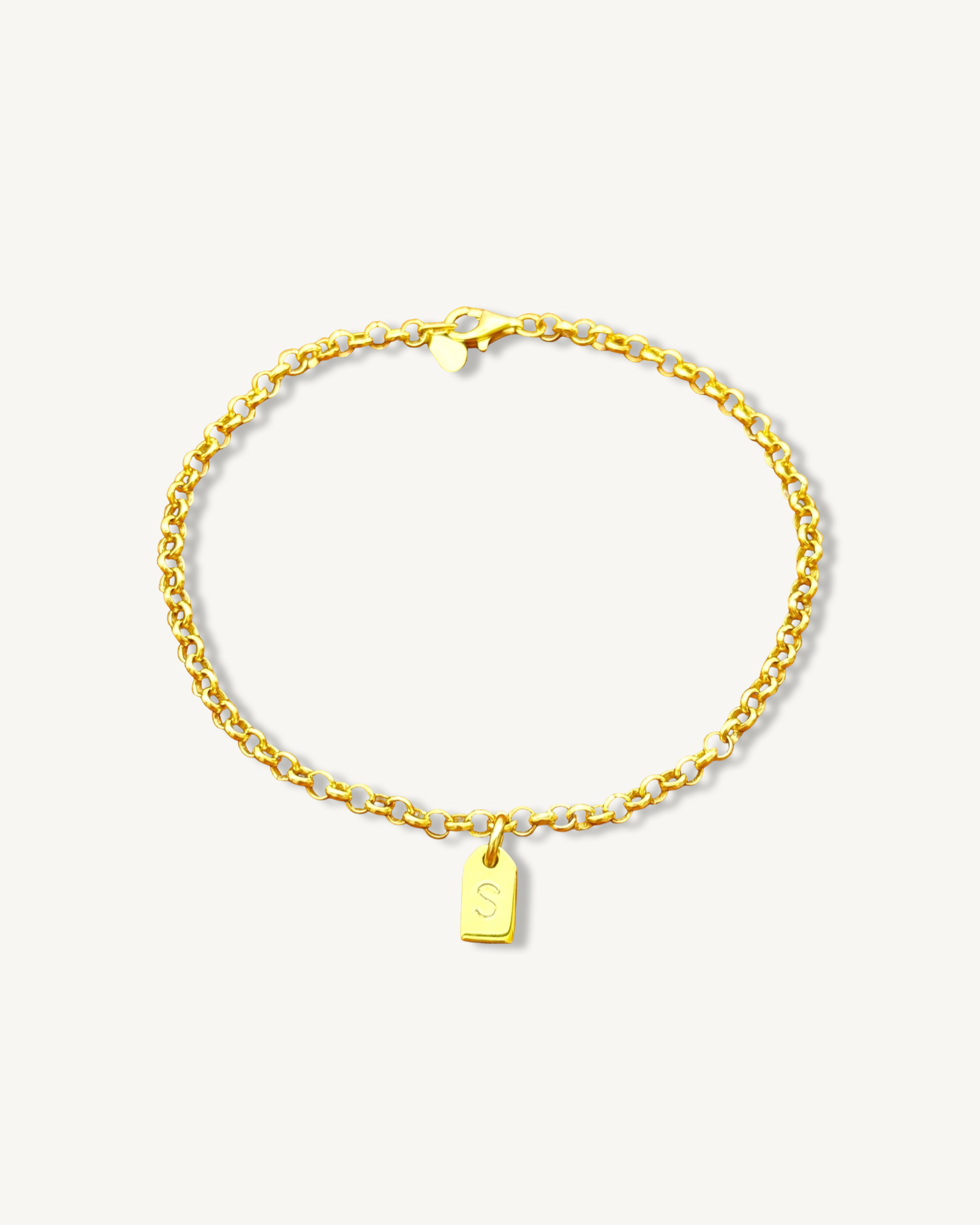 Pulsera con etiqueta inicial en cadena Rolo