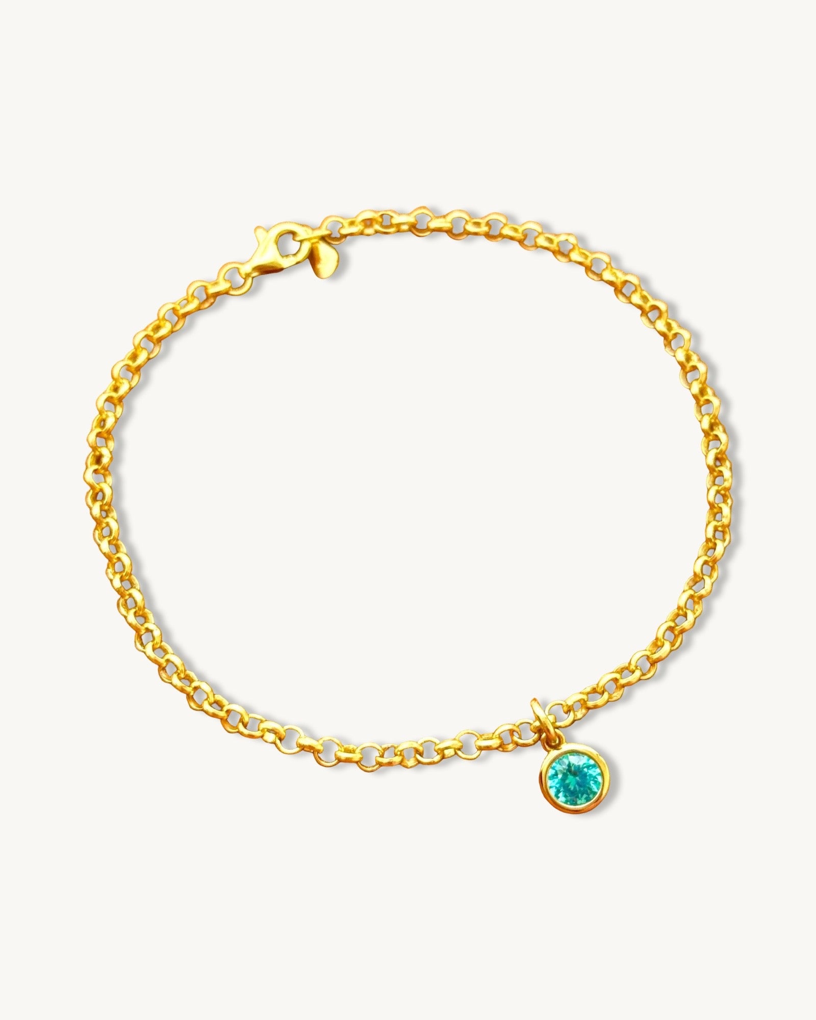 Pulsera de cadena rolo con inicial de corazón y piedra preciosa redonda