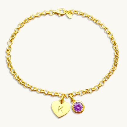 Pulsera de cadena rolo con inicial de corazón y piedra preciosa redonda