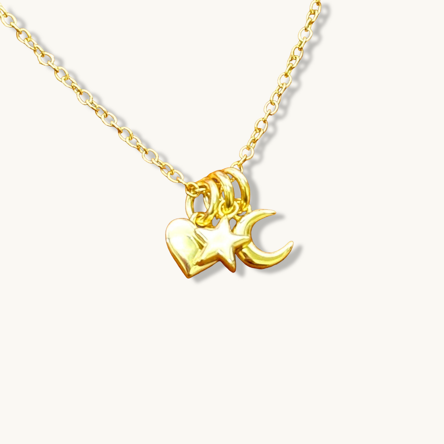 Collar de corazón, estrella y luna