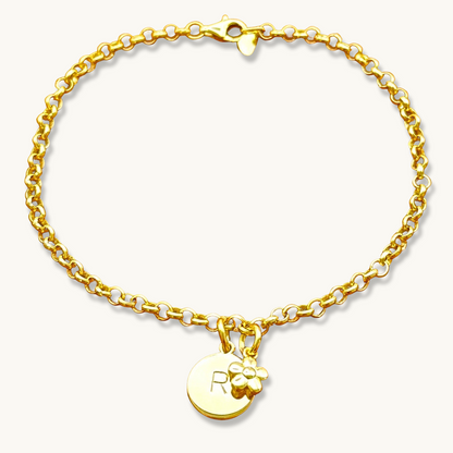 Pulsera de cadena rolo con inicial redonda y dije de flor