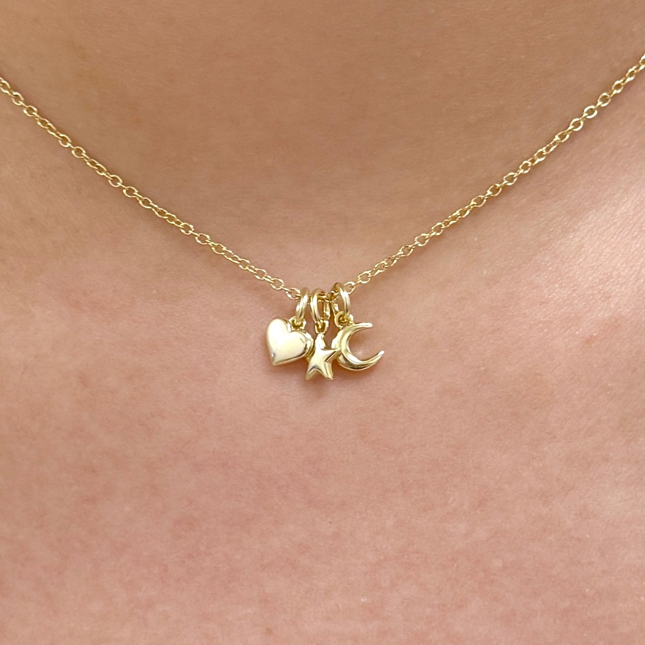 Collar de corazón, estrella y luna
